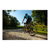 Cane Creek eeSilk+ carbon suspension seatpost for gravel and mixed surface bikes, featuring lightweight design and adjustable suspension.
