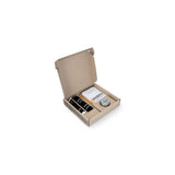 Brooks tan bike repair kit with fabric patches, glue, and zip wax accessories for travel bags repair and maintenance.