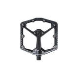 Crank Brothers Stamp 7 flat mountain bike pedal with adjustable pins, durable metal platform for MTB riding.