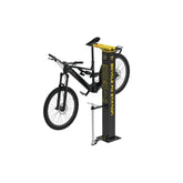 Topeak bicycle workshop fix station with multi-tool set, tire gauge, and pump in black, ideal for bike maintenance.