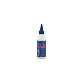 Squirt SEAL Tyre Sealant with BeadBlock for puncture protection on tubed and tubeless bike wheels, workshop setting.