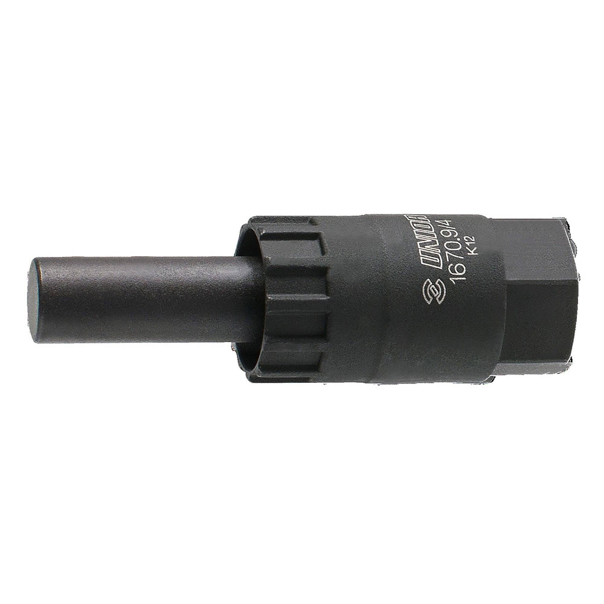 UNIOR cassette lockring tool with 12mm guide for 12mm through axle hubs, designed for bike workshop use.