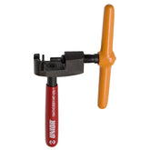 UNIOR red chain tool for 5-11 speed bike chains, used for precise maintenance and chain removal in bike workshops