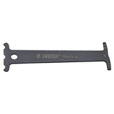 UNIOR workshop chain wear indicator tool for bicycle chain measurement and maintenance, featuring a compact, easy-to-use design.