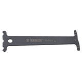 UNIOR workshop chain wear indicator tool for bicycle chain measurement and maintenance, featuring a compact, easy-to-use design.