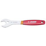 UNIOR single-sided cone wrench with ergonomic grip for bicycle maintenance, used in workshop settings for bike wheel adjustments