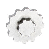 UNIOR metal crank cap tool for Shimano Hollowtech II with magnetic storage, used in bike workshops for crank arm maintenance.
