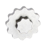 UNIOR metal crank cap tool for Shimano Hollowtech II with magnetic storage, used in bike workshops for crank arm maintenance.