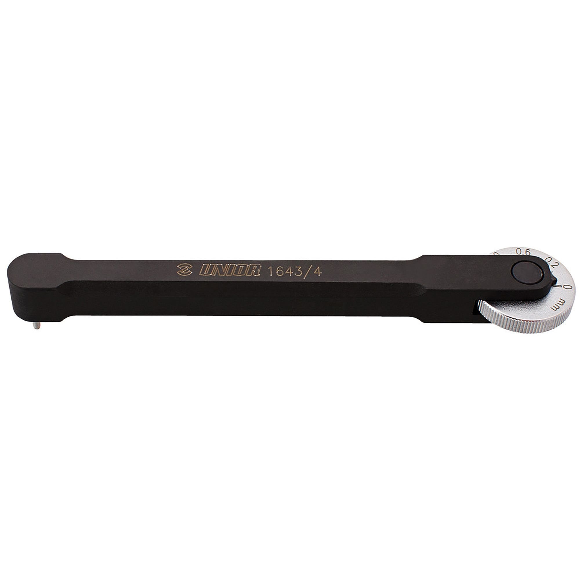 UNIOR Pro Chain Wear Indicator Tool for bike chain measurement, showing the tool with measurement markings in a workshop setting.