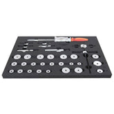 Red UNIOR bearing press tool tray for organized workshop storage, featuring compartments for workshop tools and accessories.