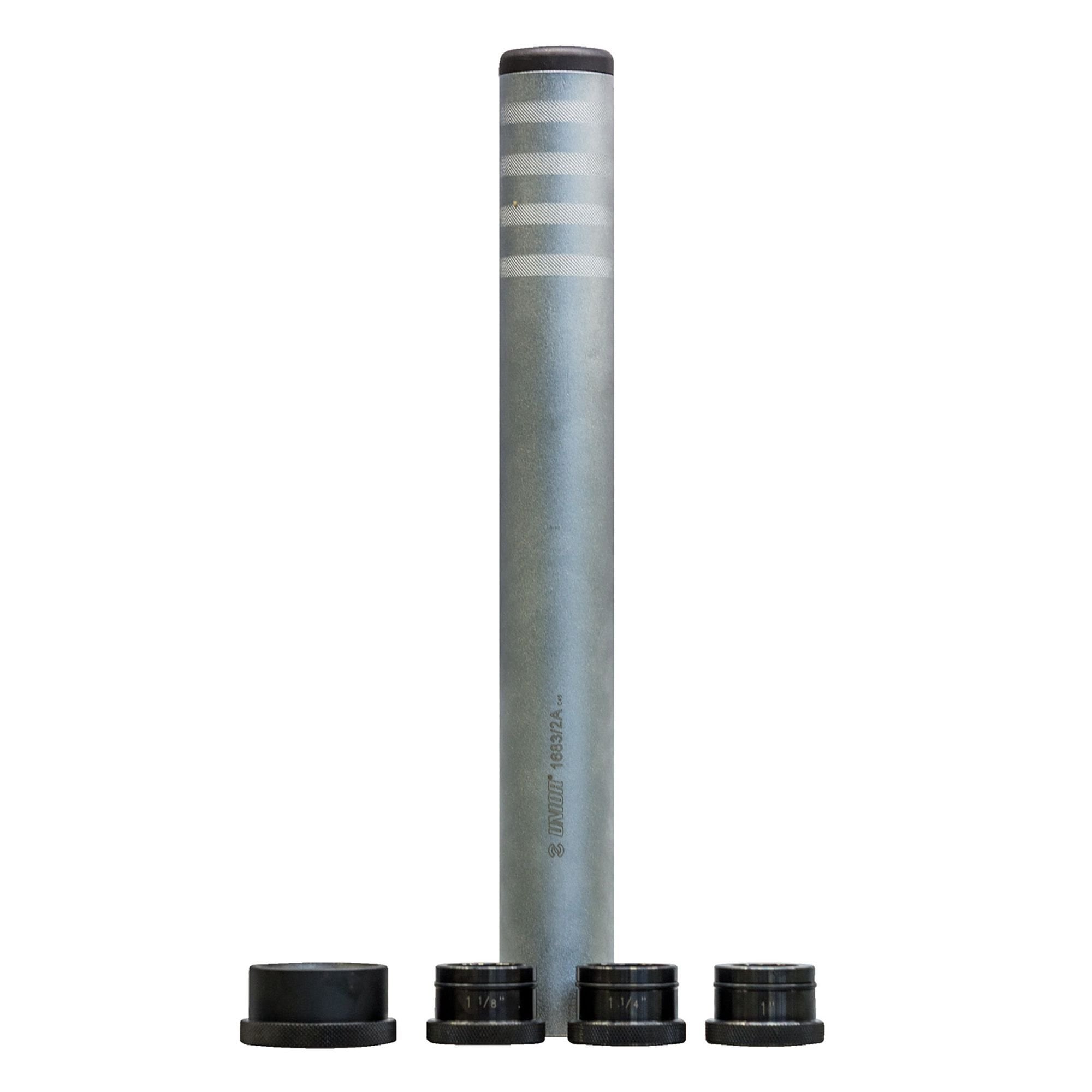 UNIOR Crown Race Setter Tool with interchangeable adapters for fork steerer tubes, used in bicycle workshop maintenance.