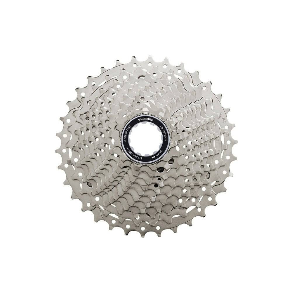 Shimano 105 CS-HG700 11-speed road bike cassette with 11-34T Hyperglide EV gears, mounted on a bike drivetrain component.
