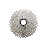 Shimano 105 CS-HG700 11-speed road bike cassette with 11-34T Hyperglide EV gears, mounted on a bike drivetrain component.