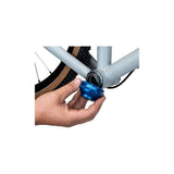 Park Tool BBT-47-12 12-Notch Bottom Bracket Tool for 50-53mm threaded bottom brackets, shown in a workshop setting.