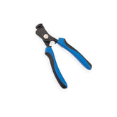 Park Tool CSH-1 workshop clamping spoke holder for wheel truing and spoke tensioning, shown in use with bicycle wheel.