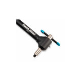 Park Tool DAG-3 derailleur hanger alignment gauge used in bike workshop for precise derailleur adjustments and repairs.