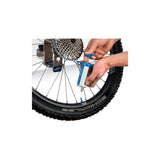 Park Tool TSI-1 tubeless sealant injector for Presta valve stems, used for workshop maintenance and tire sealing.