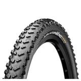 Continental Mountain King Shieldwall foldable mountain bike tire with Puregrip compound for trail riding, shown mounted on a bike wheel.