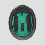 Lazer Cityzen KinetiCore urban cycling helmet with double-layer impact protection, shown in a city street setting.