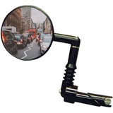 Mirrycle mountain bike mirror with adjustable convex lens, mounted on flat handlebars for rearview visibility.