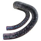 Supacaz Sticky Kush Star Fade bike handlebar tape with high grip and shock absorption, shown wrapped around handlebars.