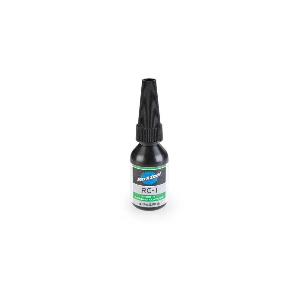 Park Tool RC-1 Green Press Fit Retaining Compound for bike non-threaded parts, shown in a workshop setting.