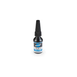 Park Tool TLR-1 Medium Strength Threadlocker for steel, aluminum, and carbon fiber bike components in a workshop setting.