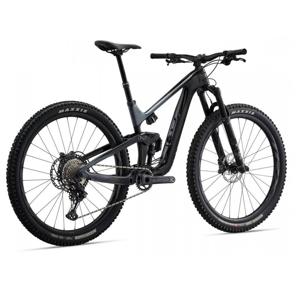 Giant Trance Advanced Pro 29 1 mountain bike with Shimano Deore XT disc brakes, featuring a full suspension frame and knobby tires.