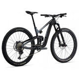 Giant Trance Advanced Pro 29 1 mountain bike with Shimano Deore XT disc brakes, featuring a full suspension frame and knobby tires.