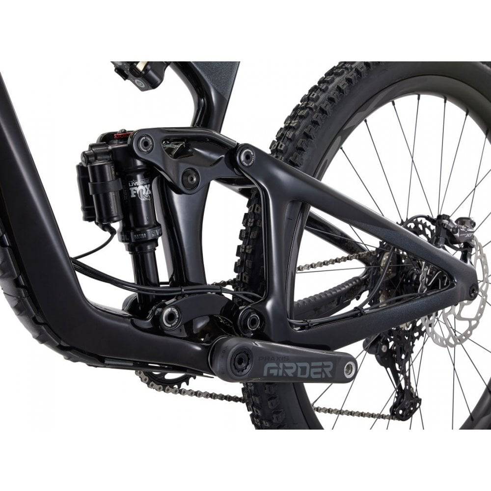 Giant Trance Advanced Pro 29 1 mountain bike with Shimano Deore XT disc brakes, featuring a full suspension and rugged tires.