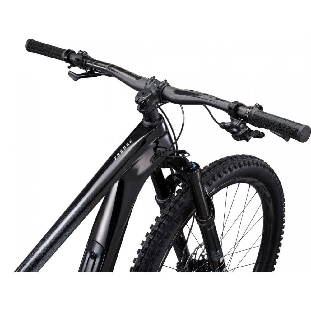 Giant Trance Advanced Pro 29 1 mountain bike with Shimano Deore XT disc brakes, featuring a full suspension and rugged tires.