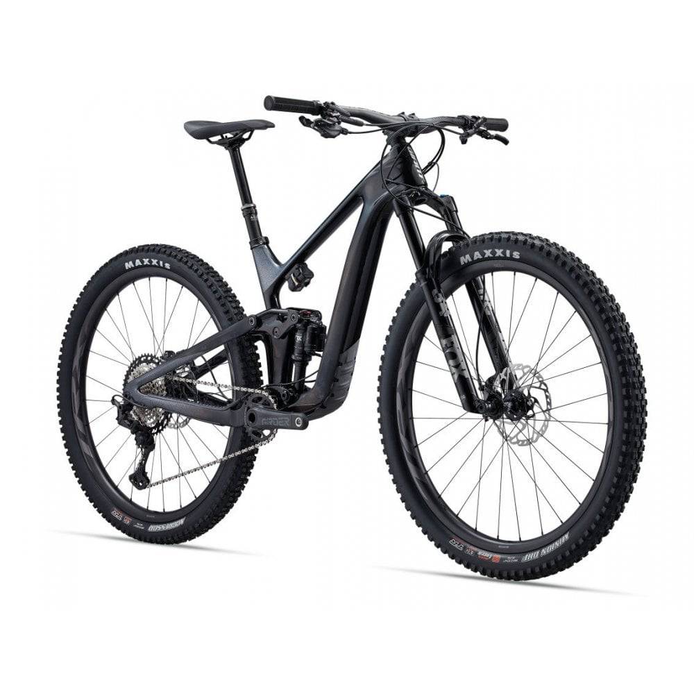 Giant Trance Advanced Pro 29 mountain bike with Shimano Deore XT disc brakes, black frame, and knobby tires for off-road riding.