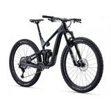 Giant Trance Advanced Pro 29 mountain bike with Shimano Deore XT disc brakes, black frame, and knobby tires for off-road riding.