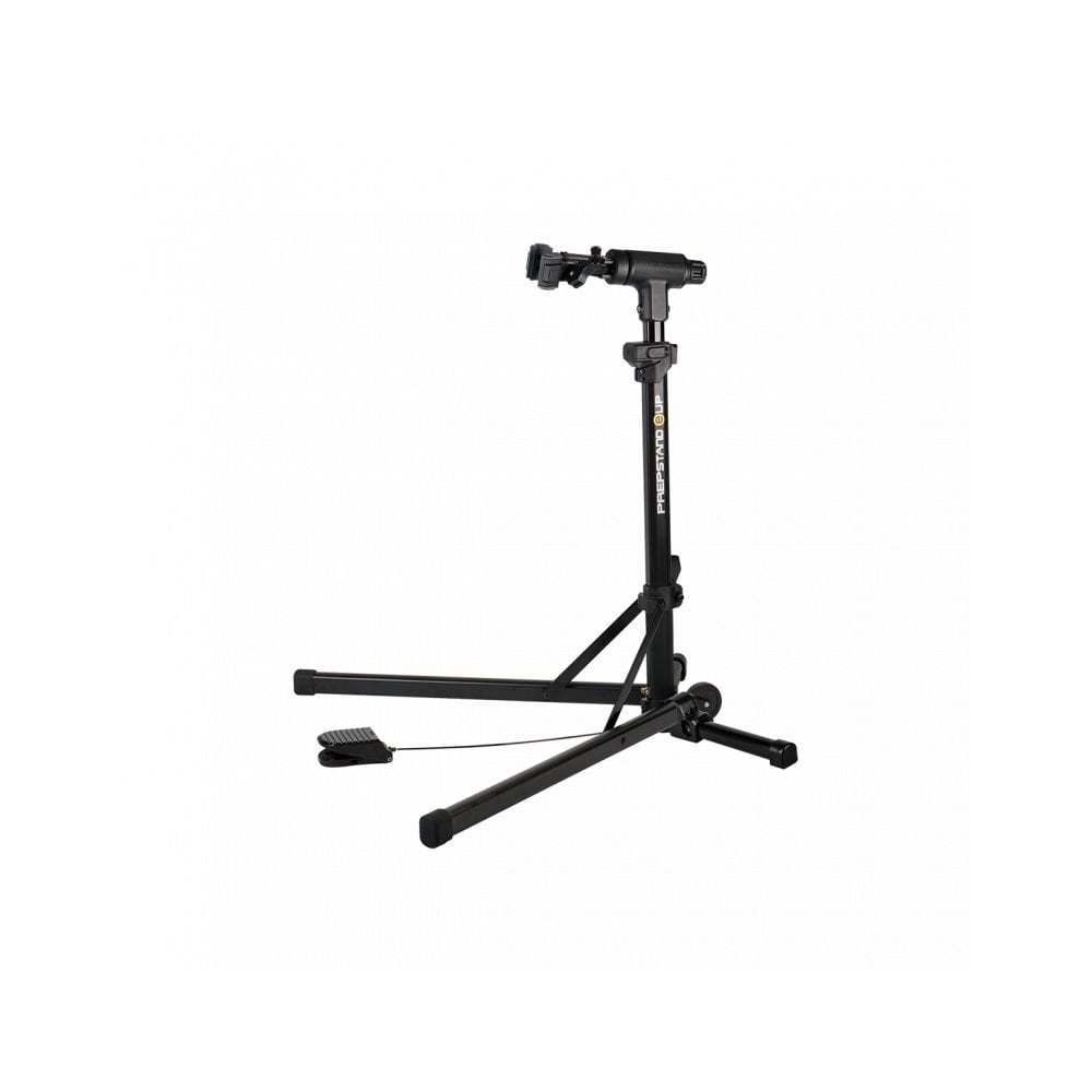 Topeak PrepStand EUP Pro foldable bike workstand holding a black e-bike, designed for heavy bikes and e-bikes in a workshop setting.
