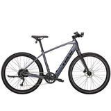 Trek Dual Sport+ 2 e-hybrid bike with HyDrive pedal assist, equipped with versatile accessories for versatile riding.