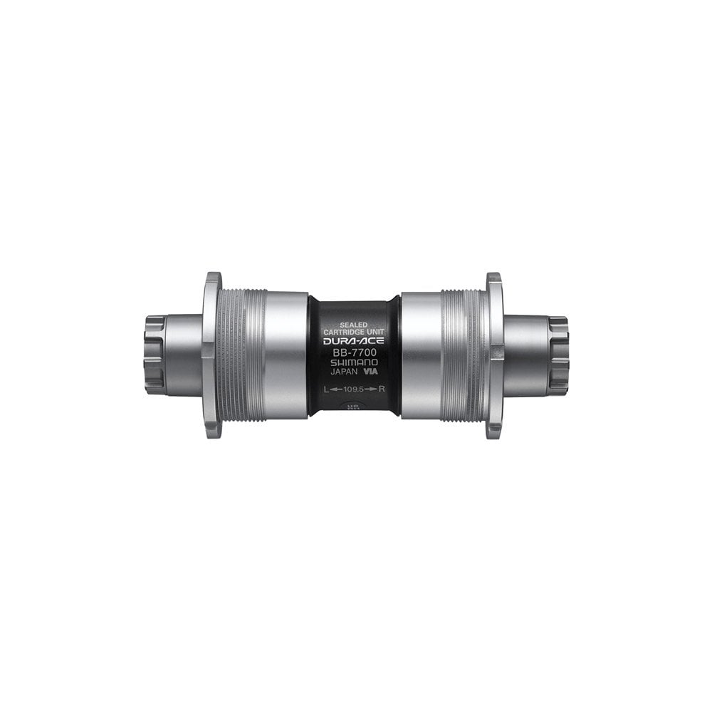 Shimano Dura-Ace BB-7700 Octalink sealed cartridge bottom bracket for road bikes, showing the metal bearing assembly.