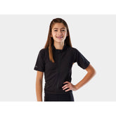 Trek Solstice youth unisex cycling jersey, breathable eco-friendly performance clothing, with vibrant colors and athletic fit.