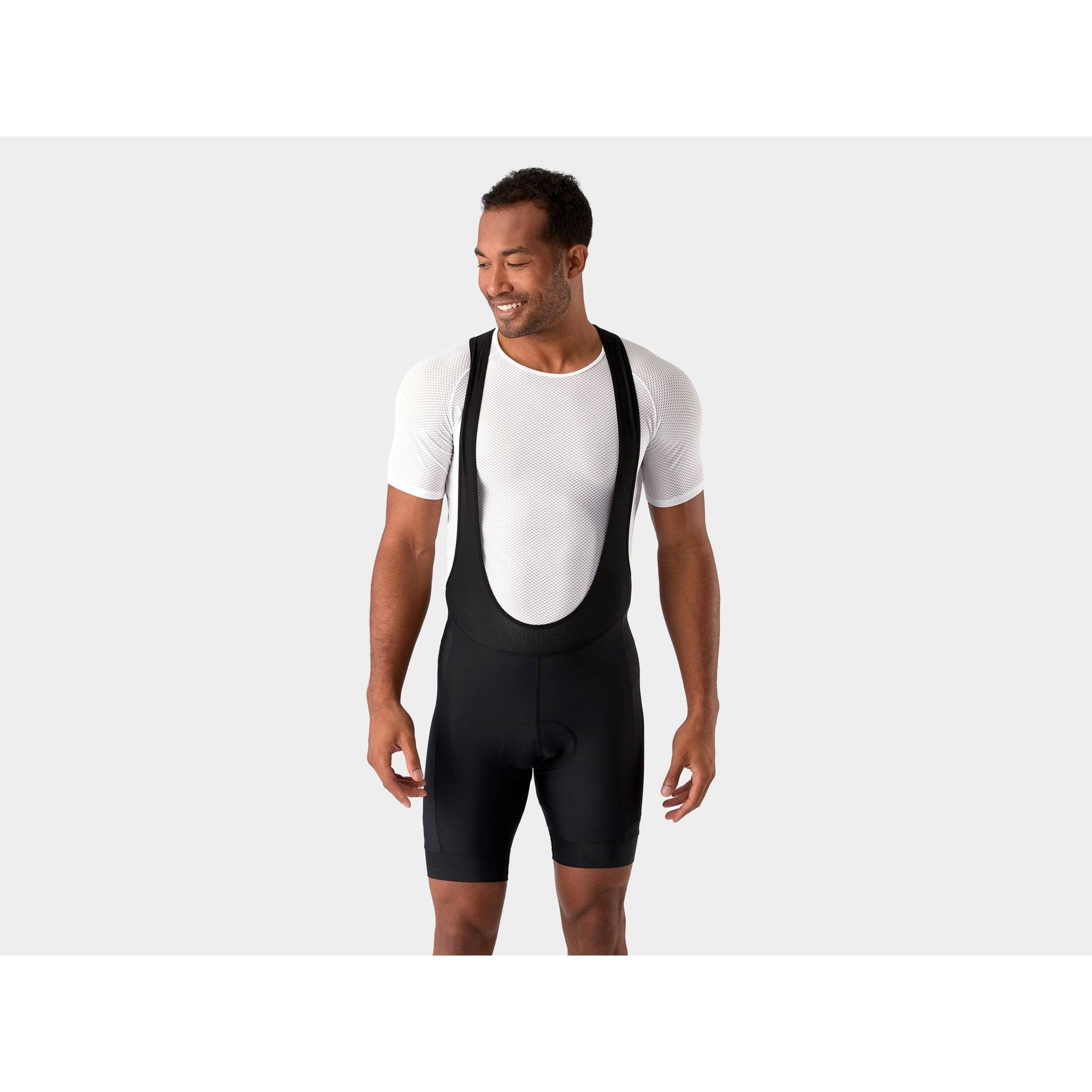 Trek Solstice unisex cycling bib shorts made from eco-friendly materials, featuring breathable fabric and padded chamois for comfort.