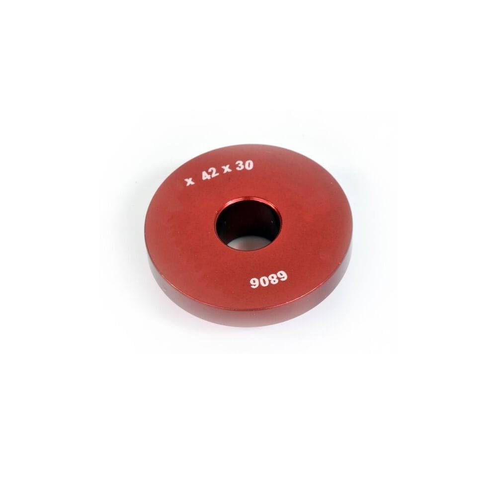 Wheels Manufacturing 30mm open bore drift tool for bearing installation and presses, showcasing metal tool with handle in workshop setting.