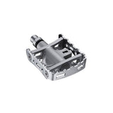 Shimano PD-M324 SPD MTB pedals with one-sided clipless and flat design, black metal with reflective reflectors.
