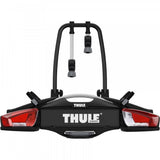 Thule VeloCompact 924021 2-bike towball carrier with 13-pin connector, mounted on a vehicle for bike transport.