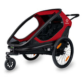 Hamax Outback Twin child bike trailer with suspension and safe connection point, designed for family cycling safety and comfort.