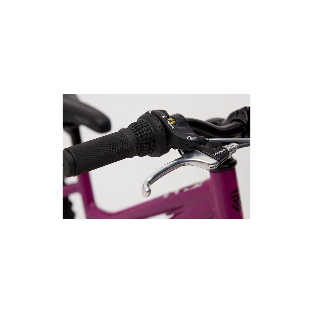 Ridgeback Harmony kids bike for ages 6-10 with lightweight aluminium frame, featuring colorful design and training wheels.