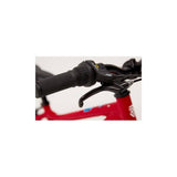 Ridgeback MX20 kids bike with Suntour fork, suitable for ages 6-10 and riders 120-140cm, shown in a vibrant color.