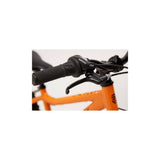 Ridgeback MX20 kids bike with Suntour fork, suitable for children aged 6-10, riders 120-140cm tall, outdoor riding scene