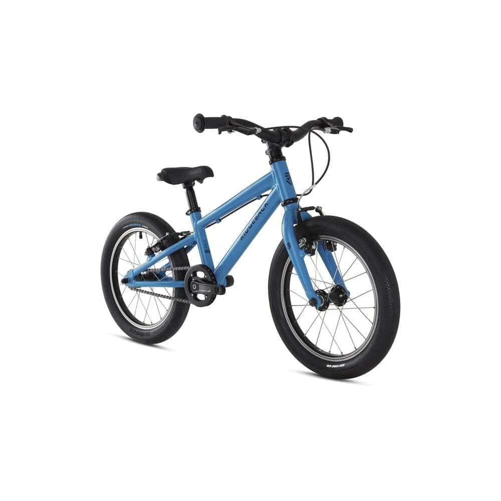 Ridgeback Destiny kids bike with lightweight aluminum frame, suitable for children 110-120cm tall, parked outdoors.