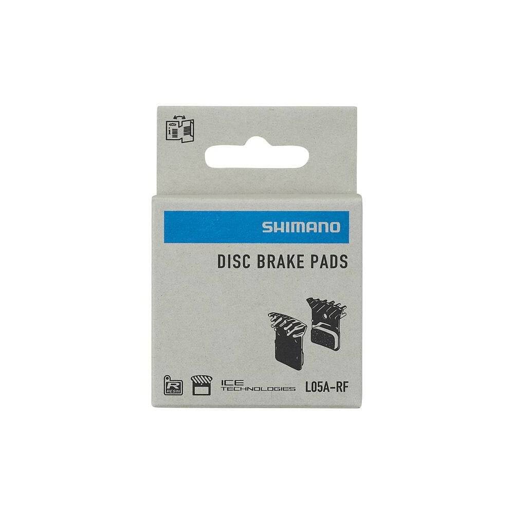 Shimano L05A-RF resin disc brake pads with alloy back, cooling fins, and spring for bicycle braking components.