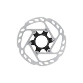 Shimano Deore SLX SM-RT64 140mm centre-lock disc brake rotor with internal lockring, mounted on a bicycle wheel.
