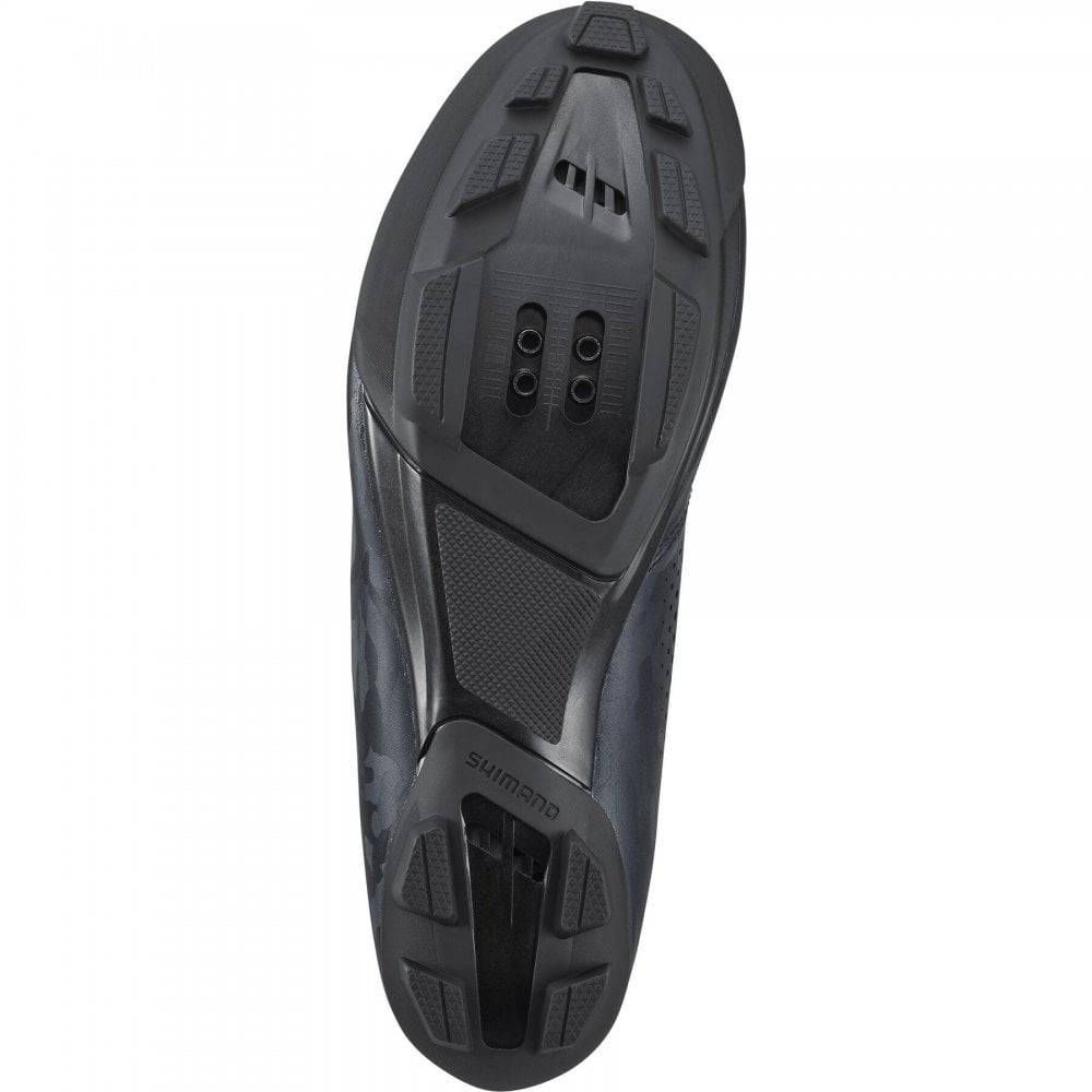 Shimano RX6W women's gravel cycling shoes with BOA dial and TPU lugs, shown in a close-up view.