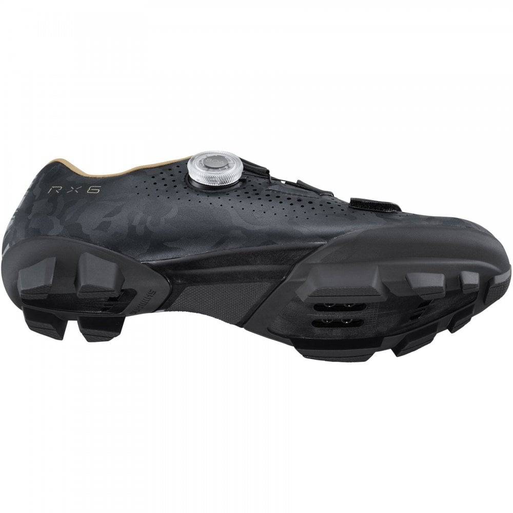 Shimano RX6W women's gravel cycling shoes with BOA dial closure and TPU lug soles, designed for outdoor cycling comfort.